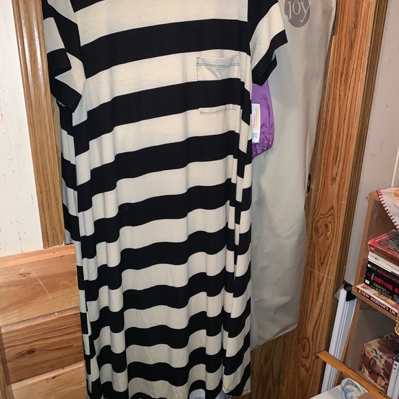 It’s a dress black and white striped. New w/o tags - Picture 2 of 2